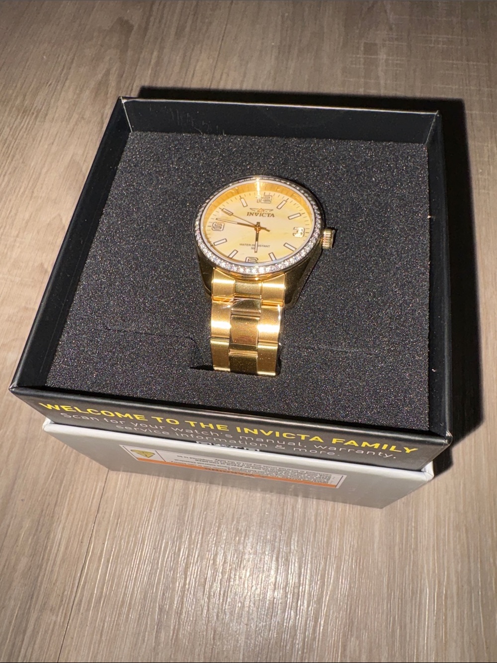 Invicta Gold Tone Watch with Crystal Bezel